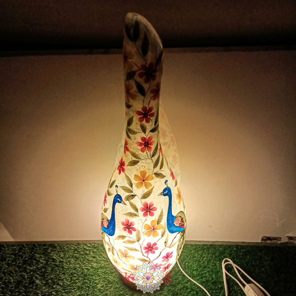 Peacock Painting Surahi Table Lamp, Camel Skin, lit view